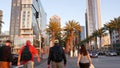 SAN DIEGO, CALIFORNIA USA - 13 FEB 2020: Pedestrians, traffic and highrise buildings in city downtown. Street life of american