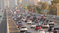 SAN DIEGO, CALIFORNIA USA - 15 JAN 2020: Busy intercity freeway, traffic jam on highway during rush hour. Urban skyline and Royalty Free Stock Photo