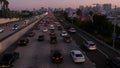 SAN DIEGO, CALIFORNIA USA - 15 JAN 2020: Busy intercity freeway, traffic jam on highway during rush hour. Urban skyline and Royalty Free Stock Photo