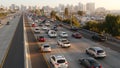 SAN DIEGO, CALIFORNIA USA - 15 JAN 2020: Busy intercity freeway, traffic jam on highway during rush hour. Urban skyline and Royalty Free Stock Photo