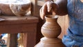 SAN DIEGO, CALIFORNIA USA - 5 JAN 2020: Potter working in mexican Oldtown, raw clay on pottery wheel. Man`s hands, ceramist in Royalty Free Stock Photo