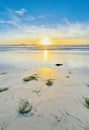 San Diego Golden Sunset: Radiating Sun, Pier Silhouette, and Seaside Serenity