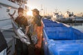 SAN DIEGO, USA - NOVEMBER 17, 2015 - fishing boat unloading tuna at sunrise Royalty Free Stock Photo