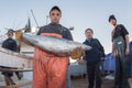 SAN DIEGO, USA - NOVEMBER 17, 2015 - fishing boat unloading tuna at sunrise