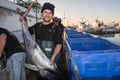 SAN DIEGO, USA - NOVEMBER 17, 2015 - fishing boat unloading tuna at sunrise Royalty Free Stock Photo