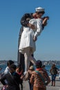 SAN DIEGO, USA - NOVEMBER 14, 2015 - People taking a selfie at sailor and nurse while kissing statue san diego