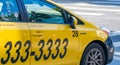 SAN FRANCISCO - AUGUST 2017: Yellow cab telephone number sign in