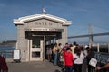 San Francisco Bay Ferry Gate G with passengers in long line waiting to board