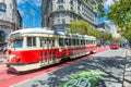 SAN FRANCISCO, CA - AUGUST 6, 2017: Red tram along city streets.