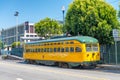 SAN FRANCISCO, CA - AUGUST 5, 2017: Yellow tram speeds up along