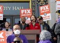 Shaw San Liu, executive director of the Chinese Progressive Association speaking at union workers rally