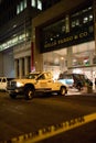 SAN FRANCISCO, CA - JANUARY 27, 2015: A tow truck pulls an SUV from the smashed front window of a Wells Fargo ban