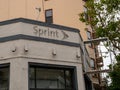 Abandoned, closed Sprint Wireless building with faint logo