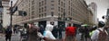 Cops with batons and helmets on block intersection of road in middle of major street during a war protest