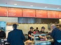 Customers served in line in Chipotle Royalty Free Stock Photo