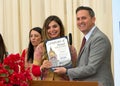 Supervisor Ahsha Safai presenting certificate of honor to Hannah Kalantari at a Nowruz celebration