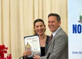 Supervisor Ahsha Safai presenting certificate of honor to Rana Pourmohamad Didehbani at a Nowruz celebration