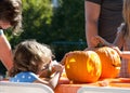 Kids carving pumpkins at Senator Scott Wieners Halloween Pumpkin Carving Event Royalty Free Stock Photo