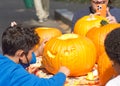 Participants carving pumpkins at Senator Scott Wiener`s Halloween Pumpkin Carving Event Royalty Free Stock Photo