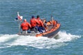 Coast Guard boat in the water with crew Royalty Free Stock Photo