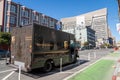 UPS delivery truck parked on crowded urban street district Royalty Free Stock Photo