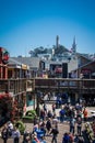 Pier 39 view from above, looking below at the tourists shopping at the gift shops and