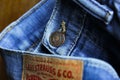 Levi Strauss 510 Jeans showing front Button and back label. Royalty Free Stock Photo