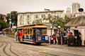 San Francisco, California / United States of America - May 27th 2013: People traveling on the historic yellow and blue cable car Royalty Free Stock Photo