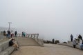 SAN FRANCISCO, CALIFORNIA, UNITED STATES - 30 October 2022: View of Golden Gate bridge hidden completely by fog Royalty Free Stock Photo