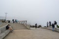 SAN FRANCISCO, CALIFORNIA, UNITED STATES - 30 October 2022: View of Golden Gate bridge hidden completely by fog Royalty Free Stock Photo