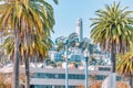 San Francisco, California, USA - October 16, 2021, coit tower framed by palm trees. Photo processed in pastel colors Royalty Free Stock Photo