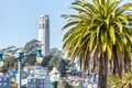 San Francisco, California, USA - October 16, 2021, coit tower framed by palm trees. Photo processed in pastel colors Royalty Free Stock Photo