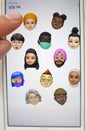 A person using the new New Memoji styles and stickers from IOS14