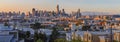 San Francisco city skyline panorama after sunset with city lights, the Bay Bridge and highway leading into the city