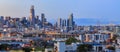 San Francisco city skyline panorama after sunset with city lights, the Bay Bridge and light trails leading into the city Royalty Free Stock Photo