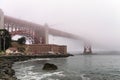 San Francisco Golden Gate Bridge shrouded by fog Royalty Free Stock Photo