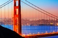 San Francisco Golden Gate Bridge sunrise through cables