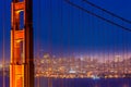 San Francisco Golden Gate Bridge sunset through cables Royalty Free Stock Photo