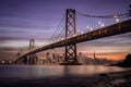 San Francisco-Oakland Bay Bridge and city skyline at sunset in California, USA Royalty Free Stock Photo