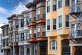 San Francisco Palette: Colorful Apartments Against Blue Cloudy Sky