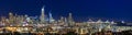 San Francisco skyline night panorama with city lights, the Bay Bridge and trail lights Royalty Free Stock Photo