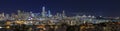 San Francisco skyline night panorama with city lights, the Bay Bridge and trail lights Royalty Free Stock Photo