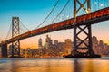 San Francisco skyline with Oakland Bay Bridge at sunset, California, USA Royalty Free Stock Photo