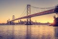 San Francisco skyline with Oakland Bay Bridge at sunset, California, USA Royalty Free Stock Photo