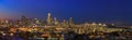 San Francisco skyline night panorama with city lights, the Bay Bridge and trail lights Royalty Free Stock Photo