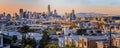 San Francisco skyline panorama at sunset with colorful clouds, Bay Bridge and financial district downtown skyscrapers Royalty Free Stock Photo