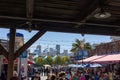 San Francisco and the tourists at pier 39, overlooking the beautiful city skyline Royalty Free Stock Photo