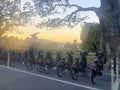 A collection of rental bikes sitting outside a park. Bay Wheels stations and bikes are available throughout San Francisco Royalty Free Stock Photo