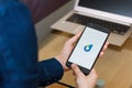 SAN FRANCISCO, US - 22 April 2019: Close up to female hands holding smartphone using Datally: data saving app by Google, San