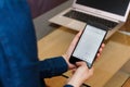 SAN FRANCISCO, US - 22 April 2019: Close up to female hands holding smartphone using Google Sheets application, San Francisco,